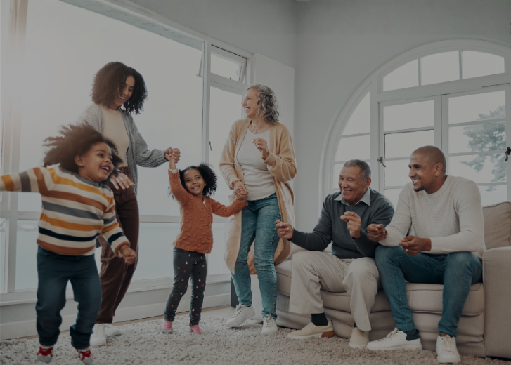 Multi-Generation Family Having Fun Playing in at Home Together